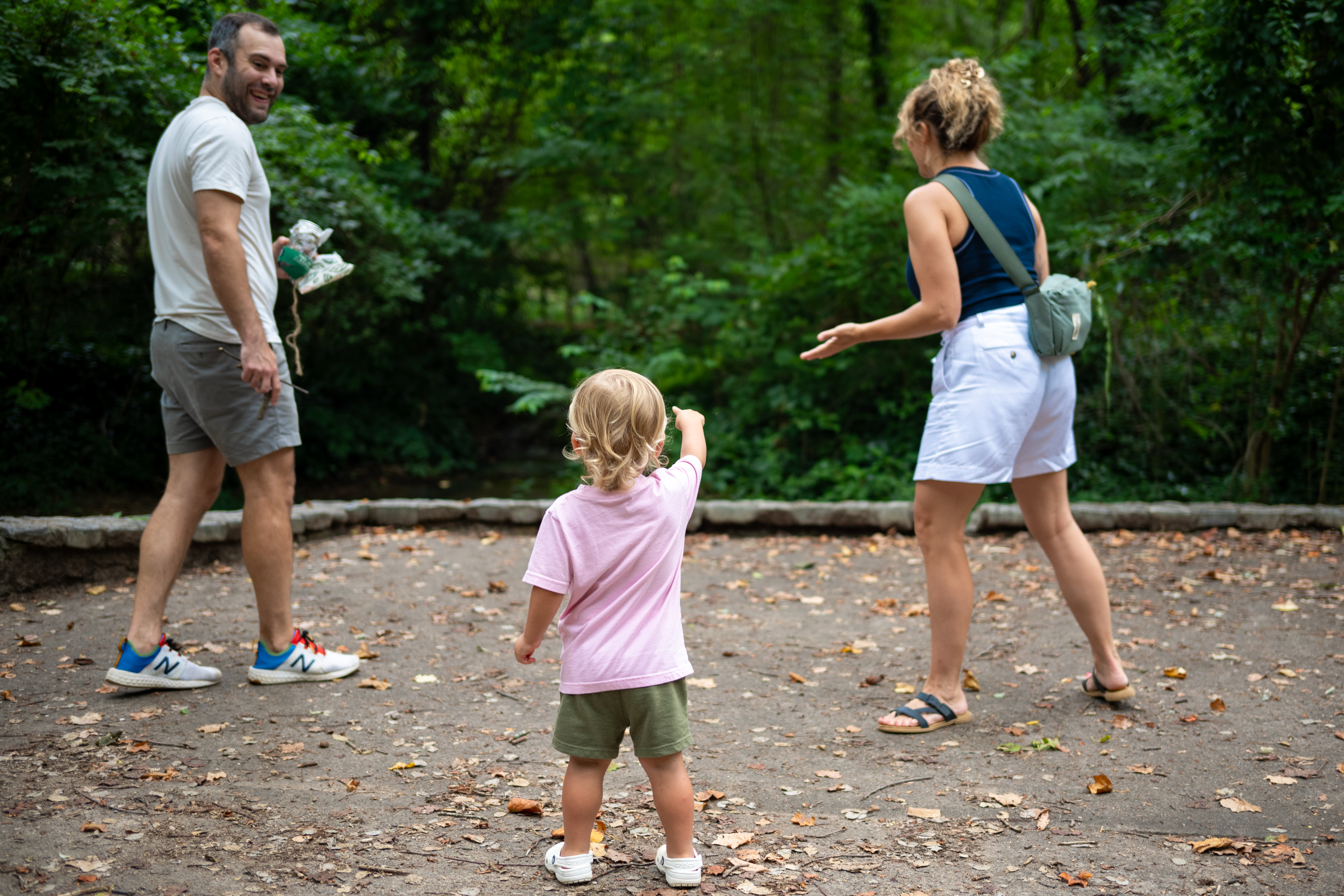 Theo Family - looking and pointing at forest
